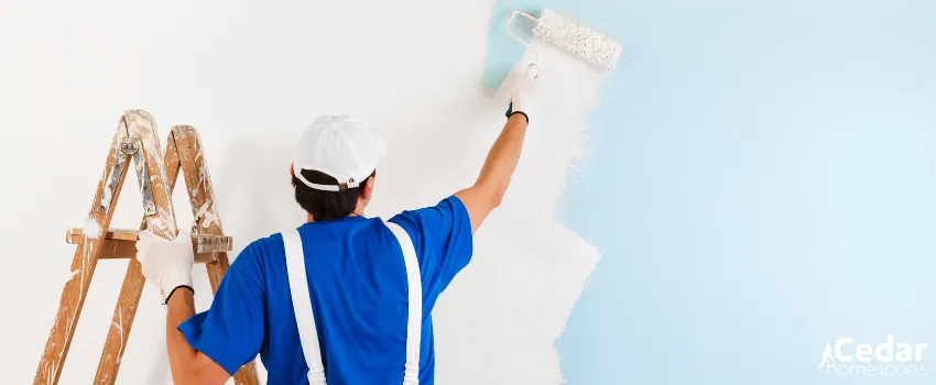 CHL - Painter painting wall with roller
